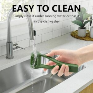 multifunctional fruit cutter being rinsed in a modern kitchen sink